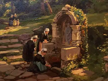 Breton women at the Sainte-Barbe fountain in Le Faouët.