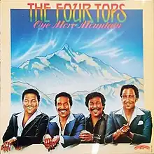 A painting of Four Tops' faces and torsos imposed over a mountain