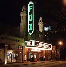 The theatre illuminated at night