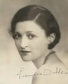 black and white portrait of young white woman with dark hair in semi-profile