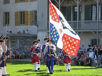 The pre-revolutionary regimental flags inspired the flag of Quebec (here, the Compagnies Franches de la Marine).