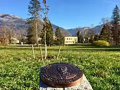 Tree of Peace in Imperial Park, Kaiservilla in Bad Ischl. In the foreground a Memorial Plaque of Ondrej Sobola