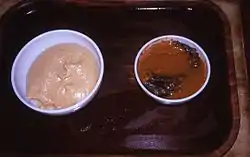 Fufu (left) and palm nut soup (right)