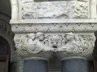 Facade capital indicating the arrival hall.