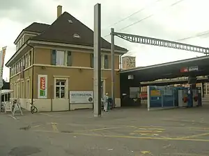 Three-story building with hip roof