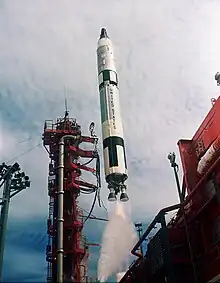 The launch of a Titan II, burning hypergolic Aerozine-50/N2O4, 1.9 MN (430,000 lbf) of thrust. Note the near-transparency of the exhaust, even in air (water is being sprayed up from below).