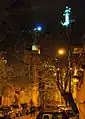 Statue from the bottom of the hill, night view