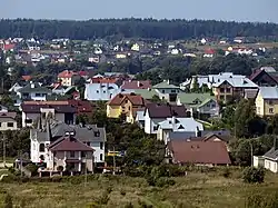 Private houses of Gineitiškės village as seen from Pašilaičiai tower blocks.