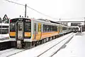 KiHa E120 on Ban'etsu West Line, December 2009