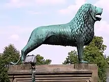 Goslar:One of the two replica lions from 1900 in front of the Imperial Palace of Goslar