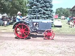 Antique tractor in the parade at the Granite Threshing Bee