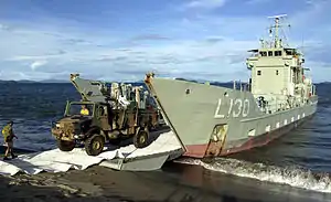 HMAS Wewak unloading or loading an Australian Army truck during Operation Bel Isi on Bougainville