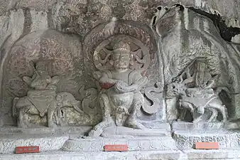 Mahakala (center) flanked by the bodhisattvas Samantabhadra (left) and Mañjuśrī (right). Baocheng Temple, Hangzhou, Zhejiang, China