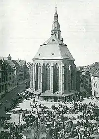 The exterior of the church and the city's central square, c. 1896