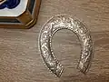 Horseshoe of silver, engraved, c. 2020