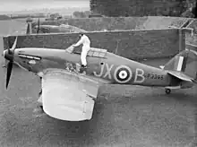 Airfield dispersal protected raised earth banking with a brick-built central divider in an E layout