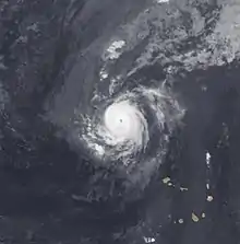 A satellite image depicting a small tropical cyclone in the eastern Atlantic Ocean.