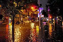 Image 12Flooding on Avenue C in Lower Manhattan caused by Hurricane Sandy. (from History of New York (state))