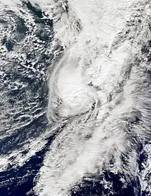 A satellite image depicting a hurricane prior to becoming absorbed by a frontal boundary on October 31.