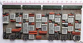 Quad-width SLT module