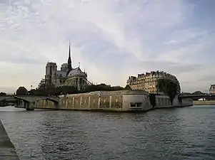 The east end of the island, and wall of the Memorial to the Martyrs of the Deportation