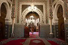 Interior of the Zawiya of Moulay Idris II showing elaborate decorative architecture