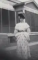 Irma Wilson, posing in the back yard by the porch, 2922 Swiss Ave.