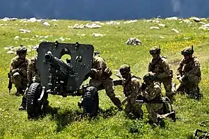 Italian mountain artillery troops with a Mod 56 in the Dolomites in 2019