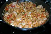 Creole Jambalaya with shrimp, ham, tomato, and Andouille sausage