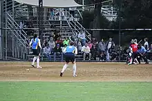 women playing softball