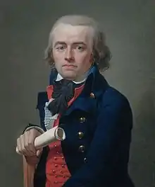 A waist-length portrait of a man seated in a simple chair against a plain green background. He is wearing a red waistcost and blue coat, holding a rolled document in his right hand. His expression is neutral as he looks directly at us.