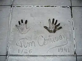 The handprints of Jim Conway in front of Hollywood Hills Amphitheater at Walt Disney World's Disney's Hollywood Studios theme park.