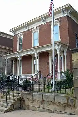 A two-story building made of bricks.