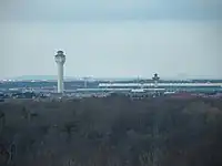 The current air traffic control tower dwarfs the original one.