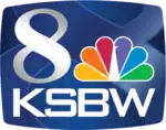 Inside a television screen shape, a serif 8 in silver next to the NBC peacock and the letters K S B W in a white, square sans serif beneath.