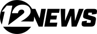 An italicized 12 in a sans serif cut out from a circle.