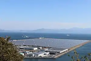 A view of industrial buildings on the coast