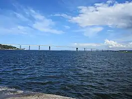 A large road bridge stretching over a body of water