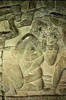 Bas relief of rear naked choke