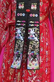 Brightly coloured Korean embroidery.