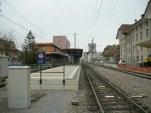 Island platform with passing track