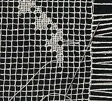 Filet lace, embroidered on an existing net