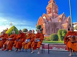 Monks relaxing at Lam Plai Mat's city center