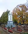 Monument with Columns of Gediminas in the Cemetery of Lithuanian soldiers in Kupiškis.