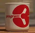 A mug with the old logo of PR3 (the 1990s).