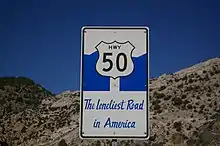 The Loneliest Road in America custom sign along the highway