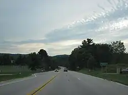 Looking south at the sign for Downsville on Wisconsin Highway 25