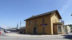 Two-story building with gabled roof