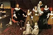 The Lucy family, English c. 1625. Two boys at the front, plus one with his mother, holding a bow as tall as himself.  The baby with the nurse may be a boy.