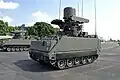 The RSAF's M113A2 Ultra Mechanised Igla IFU. Note the mast-mounted cylindrical-shaped fire-control radar.